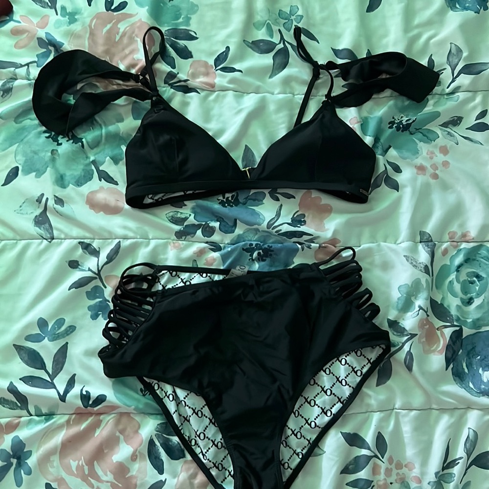 Over the shoulder black bikini with high wasted bottoms